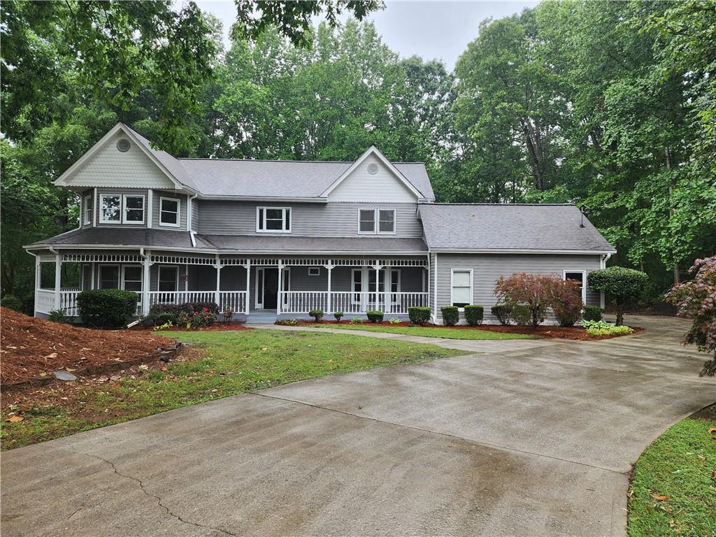 MULTIPLE OFFERS RECEIVED!! Beautiful Freshly Painted Newly Carpeted Suburban Home with Eye-Catching Porch!! Finished Basement with New Flooring with Large Living Space and Fireplace to accommodate MANY people! New Upstairs Central HVAC System, Guest Room on Main Floor and Large Kitchen with lots of Cabinetry and a Walk-In Pantry, Two Fireplaces on Main Floor, one by Family Room and one near Breakfast Area, Large Screened-In Sunroom, Huge Master Room with Walk-In Closet, Master Bathroom with Double Vanity and New Standing Shower and Free Standing European Style Tub, Move-In Ready for the New Owner, Home is a MUST-SEE to appreciate it!!