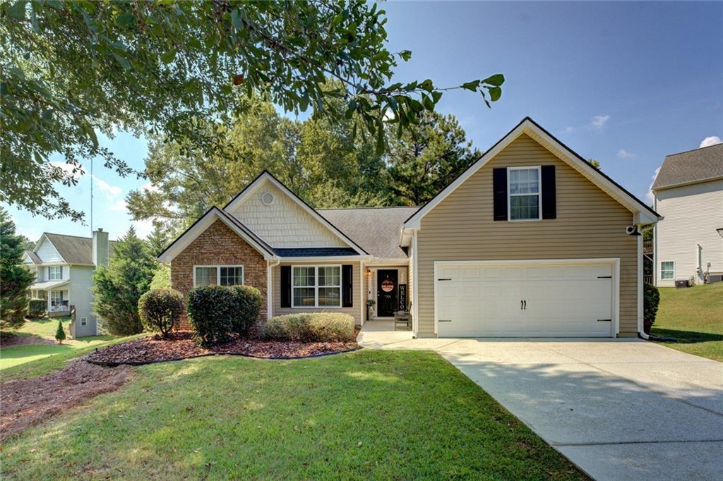 Well cared for ranch home on a culdesac street offers dining area (or flex space perfect for work from home), open and bright kitchen with breakfast bar, breakfast area and stainless steel appliances. Owner's suite with walk in closet, vaulted ceilings and bath with double vanity, large soaking garden tub and oversized separate shower. There is also a bonus room upstairs currently being used as a fourth bedroom. Enjoy grilling and barbeques on the covered patio with extended deck space. Great location convenient to dining and entertainment. Home is also located in a USDA 100% finance area!