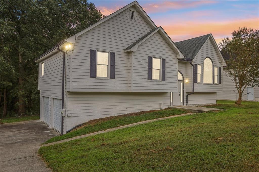 Great, raised ranch home in convenient location. Move right into this this 4 bedroom, 3 bath property. Large, level lot, and tons of yard space. Inside features a functional raised ranch floorplan with master on main, two additional bedrooms, and a bright family room. Basement offers finished space, and unfinished storage. Attached 2 car garage and large driveway with lots of parking. Easy access to both Hwy 61, Hwy 92, and 278. Convenient to schools, shopping, restaurants, and amazing local parks.