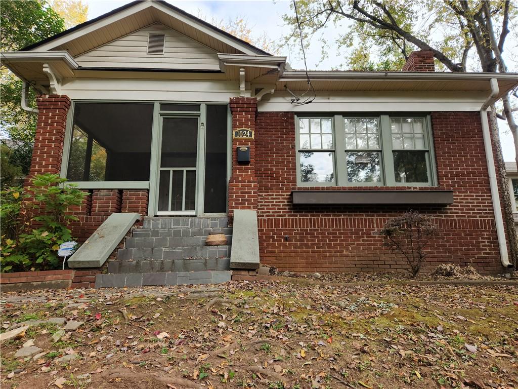 Hilltop setting in the heart of Virginia Highland. Main level has 2 bedrooms, 1 large bath (2 pedestal sinks), living room w/decorative fireplace, separate dining area open to large, old fashion kitchen with tiled countertops. Upstairs finished attic space (den/office) with walk-in closet. Laundry room, front screened porch, back patio. Off-street parking (2 spaces) is in the rear through alley access on Adair Ave, on-street parking as well. A small dog is permitted (no violent breeds - there is no fenced yard), or cat, with a $500 nonrefundable pet fee. The application process involves checking credit and running national criminal background reports. This property will be available mid-July. Please email all inquires and information requests.