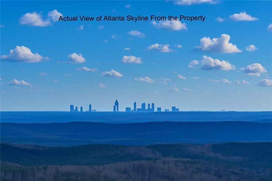 Welcome to this extraordinary opportunity to own 330+ acres of pristine land in the stunning north Cherokee County Mountains. Prepare to be captivated by the breathtaking panoramic views of the iconic Atlanta skyline that await you from this magnificent property. Natural rock bluffs dot the landscape, providing awe-inspiring vistas of the surrounding mountains, lakes, and the Metro Atlanta area. With its vast expanse and untouched beauty, this property presents an ideal setting for development. Its size and topography make it perfect for creating 5-acre lots, allowing for spacious homes and ample room for families to build their dream compound. Alternatively, for those seeking a long-term investment in the ever-growing real estate market, this property holds tremendous potential. As Metro Atlanta continues to expand towards the mountains, this land could serve as a valuable landholding, offering future opportunities for development and appreciation. A gravel road winds its way through the captivating terrain, granting you seamless access to explore the stunning surroundings. Multiple recreation vehicle trails are dispersed throughout the expansive 330-plus acres, providing endless possibilities for outdoor enthusiasts to embrace nature at its finest. The property boasts creeks and natural springs, providing opportunities to create serene lakes that would further enhance the already remarkable natural beauty of this one-of-a-kind estate. One section of the property is thoughtfully fenced, making it ideal for horses. Additionally, a charming 3-bedroom, 2-bathroom caretaker home is nestled on the land, presenting the perfect opportunity for rental income or as a comfortable hunting camp.
