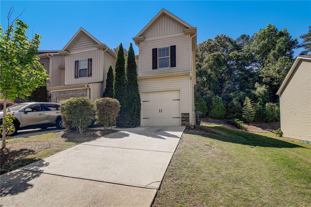May Special: Enjoy $200 off second months rent with an approved and signed lease by 5/31/2024. Welcome to your perfect blend of style, comfort, and convenience in this immaculate 3-bedroom, 2-bathroom townhome. Boasting a complete top-to-bottom remodel, this home is better than new, with fresh paint and LVP flooring throughout that exudes modern elegance at every turn. Step through the door and into a haven of contemporary living, where every detail has been carefully curated to create an atmosphere of luxury and sophistication. The spacious open-concept layout invites you to unwind and entertain in style, with plenty of room to relax or gather with loved ones. Prepare to be inspired in the chef-worthy kitchen, where sleek appliances and ample counter space make cooking a joy. Whether you're whipping up a gourmet meal or simply enjoying your morning coffee, this kitchen is sure to impress. Escape to the tranquility of your private rear patio, where outdoor living awaits. Perfect for alfresco dining, gardening, or simply soaking up the sunshine, this serene space offers a peaceful retreat from the hustle and bustle of everyday life. Enjoy the spacious owners bedroom upstairs, with large walk in closet, bathroom with double vanity and large tub. As an end unit, this townhome offers added privacy and tranquility, allowing you to enjoy the comforts of home in peace. Plus, with community amenities available, including pool access and playground, you'll have everything you need to enjoy the community. With all appliances included, including washer and dryer, this turnkey townhome is ready for you to move right in. Don't forget you are just a short distance from both the downtown areas of Woodstock and Acworth to enjoy all of the restaurants, shopping and more!
