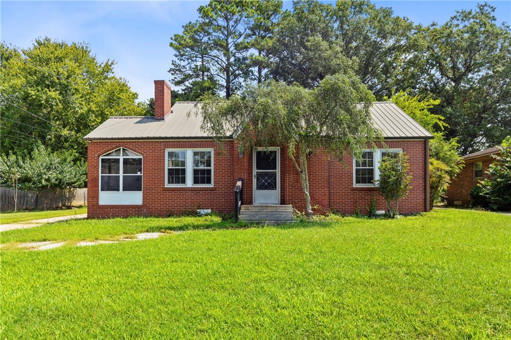 CALLING ALL INVESTORS and buyers ready to roll up their sleeves. This property is your next project! Welcome to 306 Marshall Street, a charming 1940s bungalow full of potential, located in the heart of Cedartown’s desirable north-college neighborhood. This spacious 2-bed, 1-bath property includes a detached guest house and sits on a generous 0.30-acre lot.
The main house offers:
-Original hardwood floors and a cozy decorative fireplace.
-A sunporch perfect for relaxing, working, or creating your dream hobby space.
-Two bedrooms and one full bath in a functional, easy-to-love layout.
The separate guest house adds incredible value and flexibility:
-RENOVATION opportunity!
-Includes its own bedroom, bathroom, living room, full kitchen, and dining area waiting for your personalized touch!
-Ideal for rental income, a private in-law suite, work studio, or guest quarters.
This property needs work and is priced to reflect that, offering a rare chance to renovate and customize to your taste. Whether you're an investor seeking your next flip or a buyer with vision and creativity, this home is a blank canvas BURSTING with potential.
Bring your tools, your imagination, and your offer! Schedule your private showing today and unlock the possibilities at 306 Marshall Street—a true Cedartown gem in the making.