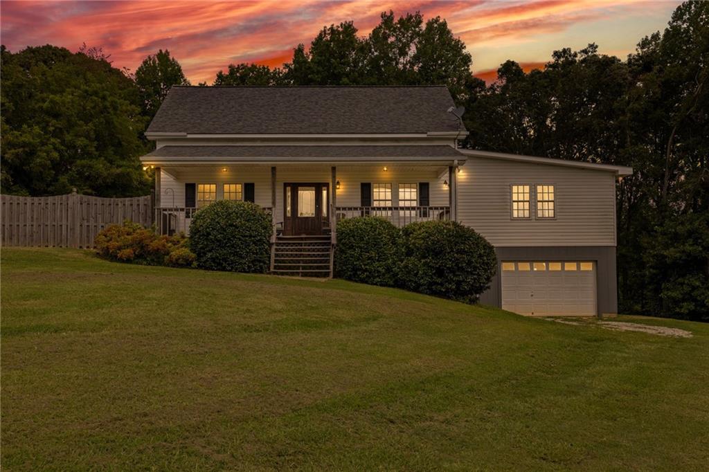 Welcome to 131 Caudell Drive in Lula... where small town charm meets country living and income producing potential! This unique property includes two separate parcels that can be purchased individually or together. A beautiful residence on 2.54 and an adjoining 31.66 acre farm with two poultry houses. The main home offers a valued kitchen and dining area, spacious living room, and an oversized owner's suite on the main level with adjoining flex space - imagine nursery, sitting room, or office. Two additional bedrooms and a full bath upstairs create a private retreat for family or guests. The terrace level has a finished bedroom, recreation room, unfinished bath, and plumbed area for a second kitchen creating the opportunity for in-law suite, teen hang out, or future rental space. With a 20x24 workshop, 20x20 parking shelter, rocking chair porch, expansive back deck, and a 14x28 saltwater pool, this property blends comfort with functionality. The adjoining acreage features two poultry houses that were in active production less than a year ago, with sellers recognized as top growers for many years. Each house is equipped with generators and ready for continued poultry operations or repurposing. The nearly 32-acre tract includes cleared farmland, a beautiful creek, and plenty of space for expansion, farming, or creating a private estate. Purchase the residence, the farm, or both together for the ultimate countryside lifestyle and investment opportunity. Conveniently located in Banks County, just minutes from Cornelia, Commerce, and Gainesville, and less than an hour from Athens or Atlanta, this property combines peaceful country living with easy access to everything you need! This is a must see!!!