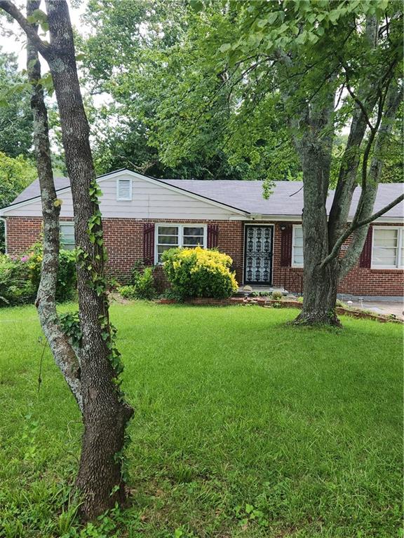 All-brick 3BR/1BA home with tons of potential! Perfect for investors or buyers who enjoy DIY projects. Home needs TLC. The kitchen has no appliances or cabinets, offering a blank canvas for your ideal design. Located in a quiet neighborhood with easy access to I-285, schools, shopping, and dining. Sold AS IS. Great opportunity to renovate and build equity in a growing area!
