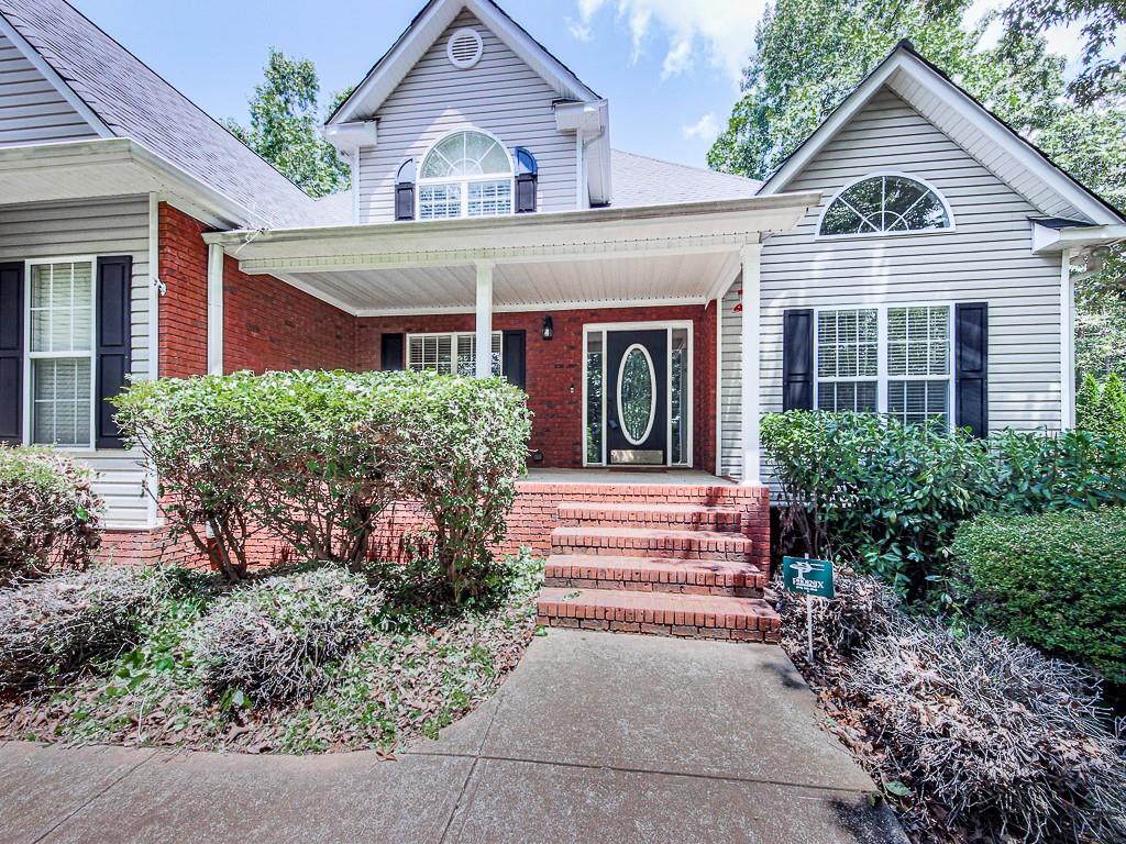 Large, 4 bed, 2 1/2 bath home on full basement in great, swim/tennis neighborhood. Elegant entry Foyer greets you as you enter the home. The separate dining room has a dramatic cathedral ceiling. The Kitchen is huge and open and has a bar with seating for four. The Breakfast room is very large and has a cathedral ceiling and French doors that open onto the back deck overlooking the private, fenced, back yard. Huge, 2 story Family room has a beautiful stacked-stone fireplace with gas starter. The Master-on-Main is huge with plenty of room if you have large bedroom furniture and has a large walk-in closet plus a linen closet. The Master bath has a double vanity, whirlpool tub, separate shower, private toilet, and ceramic tile floor. Great laundry room and a guest bath on the main level. Lots of crown molding and most of the mail level is covered in beautiful hardwood floors. Three good sized secondary bedrooms upstairs all have walk-in closets. Huge Bonus room upstairs great for office, exercise room, “man cave”, whatever you want. Hall bath upstairs has double vanity and tile floor. Huge, unfinished basement with high ceilings and tankless water heater would be great to finish. Roll-up door in basement provides easy access for lawn equipment. Storage building out back. Close to lake Allatoona, shopping, entertainment, and great schools. Come see for yourself!