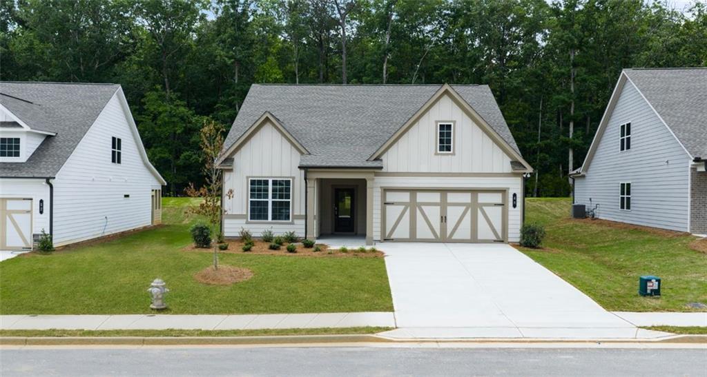 Candleberry Place is an amenity-rich community offering low-maintenance living with main-level owners' suites, second-floor lofts and wooded backyards in Sharpsburg, GA. Homeowners can enjoy community amenities including a resort-style swimming pool with furnished cabanas, a convenient pool house and walking trails perfect for daily exercise.