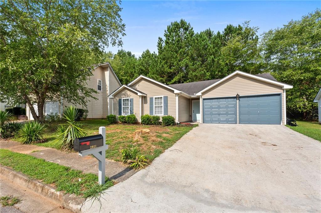 Come see this RECENTLY RENOVATED home you've been searching for. NEW Stainless steel APPLIANCES, freshly painted, move-in ready. This very open airy-floor plan features vaulted ceilings and a cozy fireplace in the great room, creating a warm and inviting atmosphere. The family room seamlessly flows into the kitchen and dining area, perfect for entertaining and everyday living. The kitchen hosts eye-catching cabinets, solid surface counters, and new appliances. Your large master suite is a true retreat, boasting a walk-in closet and a master bathroom with a double vanity, separate tub, and shower. Explore local hiking trails, parks, and recreational facilities, easy access to MARTA & major highways for convenient commuting. This home is NOT leased through Craigslist. Beware of scammers. Please make direct contact with our office for inquiries. Agents please use Showingtime to view today. See Private Remarks.
