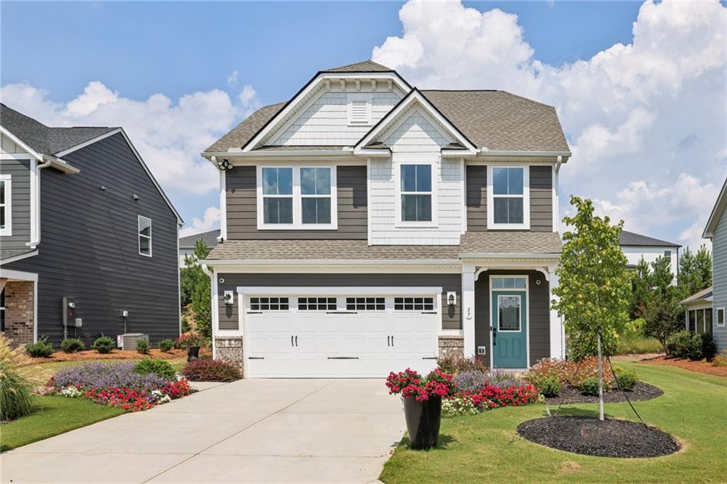 Better than new! This never-lived-in Ryan Homes Ferncliff model is now available in the highly sought-after Twin Lakes community—offering the perfect blend of modern design, quality construction, and resort-style living without the wait of new construction. This beautifully designed 3-bedroom, 2.5-bath home features an open-concept main level with a spacious family room and a stunning kitchen, complete with an oversized island, sleek 42" cabinets, and GE stainless steel appliances. The refrigerator, washer, and dryer are all included, making this truly move-in ready.
Stylish luxury vinyl flooring runs throughout the main level, bathrooms, and laundry room, adding both elegance and durability. Upstairs, you'll find comfortable bedrooms and well-appointed bathrooms, ideal for families, professionals, or those looking to enjoy the low-maintenance lifestyle of a brand-new home.
As a resident of Twin Lakes, you'll enjoy an unbeatable list of resort-style amenities, including two community pools with a splash pad, a clubhouse with an open-air pavilion and fully equipped fitness center, scenic nature trails for walking or jogging, a playground, two dog parks, and access to two beautiful lakes for fishing, canoeing, or kayaking.
Located just 2.5 miles from I-85, Twin Lakes offers unmatched convenience for commuting or weekend adventures. You're less than five miles from local shopping at Publix, Kroger Marketplace, and Joy Company Market, and just minutes from charming downtown Hoschton and Braselton, known for their dining, shopping, and small-town charm. Enjoy world-class wine tasting at Chateau Elan Winery & Resort just 10 minutes away, take a short 20-minute drive to the Mall of Georgia, or head to Downtown Atlanta, only 35 miles from your doorstep.
This is a rare opportunity to own a model home with premium upgrades in one of the area's fastest-growing and most desirable communities. Schedule your showing today!