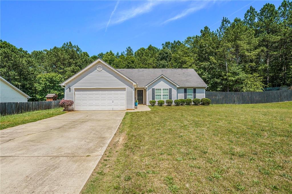 Check out this great ranch on a huge level lot! This property features a fantastic, fenced, level lot in a great location. Vaulted ceilings in the family room and kitchen. 2 car attached garage. Master suite features a tray ceiling and updated master bath with tile, newer vanity, soaker tub, and separate shower. Don't miss your chance on a great ranch in a rare price point!