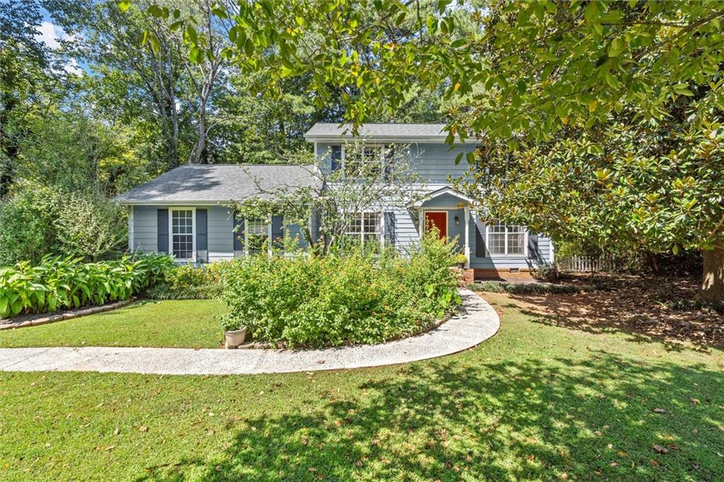 This lovely house is waiting for you to call it HOME. Located in North Landing—a true gem in the sought-after Kell Cluster School district. This 4 bedroom and 2 and a half bathroom home offers so many conveniences! It’s located in a quiet cul-de-sac, on a beautifully landscaped garden and a very large fenced flat lot. Enjoy the lovely butterfly garden and entertain your family and friends on the recently maintained and painted back deck. The main level offers a living room and a family room, a breakfast area and a separate dining room, a walk-in pantry and laundry area next to the spacious kitchen. A convenient flex room that can double as a bedroom or an office right next to the bathroom completes the first level. The three bedrooms upstairs are spacious, especially the oversized primary bedroom, which can accommodate a sitting area for your end of day relaxation time. Here are the latest improvements: Updated bathrooms, including tiled floors. Hardwood and LVP flooring through out. New HVAC installed in 2023, and was recently serviced. New roof installed 4 years ago and bathrooms updated in 2018. The North Landing community offers a VOLUNTARY HOA! Amenities include a 14-acre lake for fishing, a salt water pool, two lighted tennis and pickleball courts, extensive grounds, an 18-hole Disc Golf course, children's play areas, and a Clubhouse, which is available for rentals. For more information on voluntary HOA: northlandinghoa.com This charming home is conveniently located close to top rated schools, shopping, entertainment, and access to main highways I-75 and I-575. It is truly a wonderful opportunity at a fantastic price. Don’t miss it!