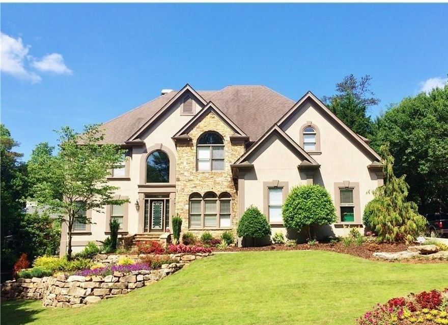 SHOWING BY APPOINTMENT ONLY. Minimum requirement: 680+ credit score, $12,000+ combined monthly income, employment verification, background check, $10,000+ in bank reserves, good references...etc.   The home is FULLY FURNISHED.

Stunning executive dreamhome awaits you. Located in highly sought-after Johns Creek and five-star school district of Dolvin/Autry Mill. Main level boasts a formal living & dining room, full bath, and guest-suite. Open kitchen w/Jen Air professional range, double oven, exotic granite countertops, pot filler, & open floor plan to the entertaining deck, living room and breakfast area. Spa-quality master bath with enclosed custom steam shower, oversized walk-in closet, and large soaking tub.  Master bedroom boasts a sitting area overlooking the koi pond and private screened porch to set up to enjoy as you wish.  Upstairs laundry for convenience, large upstairs guest suite with private bath, and two additional bedrooms connected by a jack-and-jill bath.  Basement offers an entire separate living quarters, complete with two bedrooms, full bathroom, kitchen, entertaining area with fireplace and media room.  Too many upgrades to mention!  Back yard is fully fenced, and the custom koi pond with waterfall is an absolutely stunning feature, providing a relaxing oasis right in your back yard!  Home is directly across the street from playground, 12 lighted tennis courts complete with tennis director, Junior olympic pools, gym & clubhouse and large private lake.  Enjoy top-notch amenities, neighborhood socials & gatherings, youth swim team, tennis competitions, and many other perks!