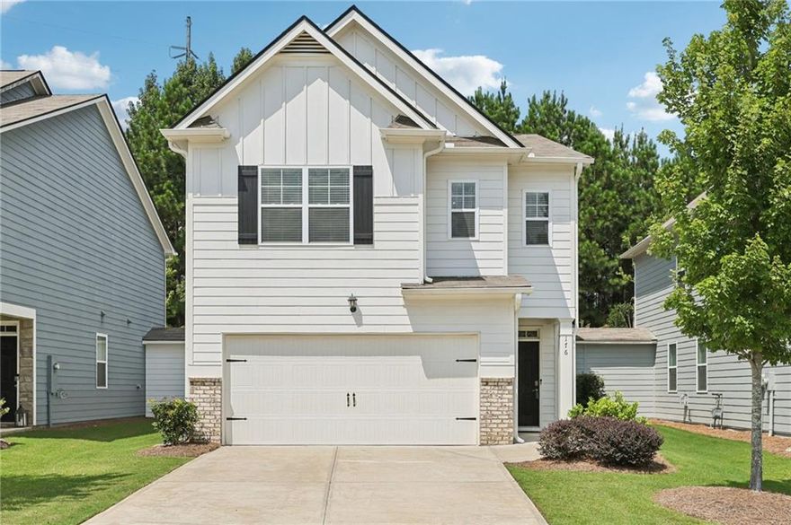 Move-in ready home offering fresh updates and everyday convenience! The main level features beautiful, low-maintenance vinyl wood flooring throughout. Enjoy a bright, open-concept living room with plenty of natural light and a cozy fireplace, flowing effortlessly into the stylish kitchen with a large island with seating, granite counters, stainless steel appliances, and generous cabinet storage. A half bath completes the first floor. Upstairs, the primary suite impresses with a tray ceiling, en-suite bath with dual sinks, soaking tub, separate glass shower, and two walk-in closets. Two secondary bedrooms share a full hall bath, and the laundry room is conveniently upstairs as well! Outside, relax on the spacious patio ideal for grilling and entertaining, plus a private green space backing to woods. Two storage areas provide extra organization! Recent updates include fresh caulking and exterior pressure wash, plus all wood trim painted including fascia, soffits, gutters, and downspouts. Fantastic location near Hwy 92—schedule your showing today! Mortgage savings may be available for buyers of this listing.