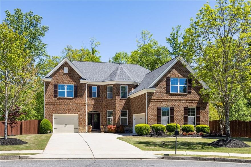 Nestled on a quiet cul-de-sac in the Peyton Farm neighborhood, in the ideal location just a mile from Downtown Alpharetta, this meticulously maintained 6-bedroom, 5-bath home offers the perfect balance of luxury, comfort, and convenience. Thoughtfully upgraded and move-in ready, this home features a sunlit open floorplan with a seamless flow to the fireside family room. For summer entertaining and dinner parties - there is a formal dining room with a tray ceiling as well as an informal dining area next to the stunning gourmet kitchen with Cambria quartz counters, marble tile backsplash, stainless appliances, island with seating and a hidden walk-in pantry. A light-filled sunroom that opens to a screened porch is perfect for guests year-round. Completing the main level is a full bedroom and bathroom currently used as a home office. Upstairs, the oversized Primary Suite stuns with a tray ceiling, owner’s retreat with fireplace, a spa-inspired bath with a soaking tub and dual vanities, and a custom closet, complete with packing table. Three generously sized bedrooms complete the top level. This home offers three full levels of living space with a finished basement that includes a full bedroom, full bath, media room and kitchenette. The enclosed terrace level patio overlooks the fenced, landscaped, and private backyard. Numerous upgrades include: newer roof, gutter guards, light-commercial water heater and newly installed carpet. Zoned for top-rated Alpharetta Elementary, Northwestern Middle, and Milton High schools and within close proximity to private schools, parks, shopping, dining, and GA-400 all nearby, this is Alpharetta living at its finest. This prime location also provides easy access to Wills Park, known for its beautiful pool, trails, playgrounds, and sports facilities, perfect for outdoor activities. Additionally, Downtown Crabapple and Avalon are just minutes away, ensuring convenient access to even more shopping, dining, and entertainment options. *Select photos have been virtually staged to show living space/bedroom furniture within the property.*