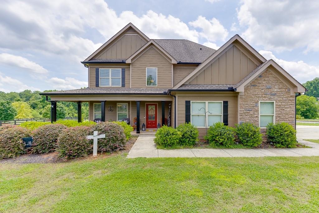 Welcome to this beautiful Craftsman-style home in the highly sought-after Finch Landing subdivision! Built in 2019, this charming two-story residence sits on a generously sized 0.75-acre wooded lot, offering privacy and serenity with a rocking chair front porch perfect for relaxing evenings.
Inside, you'll find an open-concept floor plan featuring rich hardwood flooring, a wood-burning fireplace, and a spacious separate dining room ideal for entertaining. The heart of the home is the kitchen, boasting custom-built cabinetry, granite countertops, and modern finishes throughout.
Upstairs, the large owner's suite provides a peaceful retreat with a luxurious bathroom that includes a garden tub, separate shower, and granite vanity countertops. Additional highlights include upgraded wall-to-wall carpet, quality craftsmanship, and attention to detail in every room.
This home qualifies for 100% USDA financing.