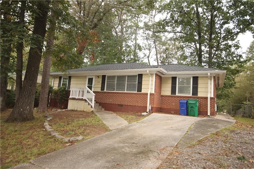 Charming, updated brick ranch with hardwood floors and fenced backyard. Updated kitchen with stainless steel appliances and ample cabinetry, living room, and addtional flex room off the kitchen that could be used as a separate dining room, an office, or a 4th bedroom. Original bathroom is recently renovated and a 2nd full bathroom was just added. Laundry closet with washer/dryer included. Tenant is responsible for lawn care and all utilities (power, water and gas). Adult pets over the age of 1 are negotiable with pet fee. 1 year lease term or longer available. House is ready for immediate move-in and lease can start anytime between now and 30 days out. $55 application fee per adult and all adults living in the home must apply and be listed as Leaseholders. Security deposit equal to one month's rent is paid within 3 days of application acceptance. You must tour this house in person in order to apply. No smoking allowed.