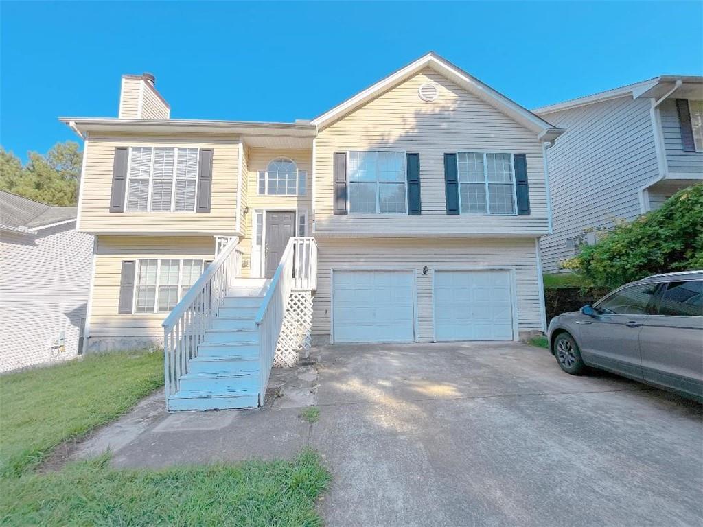 I-85 N TO INDIAN TRAIL LILBURN RD, LFT ON TO STEVE REYNOLDS BLVD, RT ONTO FALLING WATER LN
Unique home in a convenient location, close to 85, restaurants, and shopping. Move in ready, split-level home, open and airy! Kitchen offers granite counter tops, beautiful, tiled backsplash, double stainless-steel sinks and stainless-steel appliances! Upstairs features family room with brick fireplace, formal dining room and eating kitchen towards to the deck look over the woods, master bedroom has trayed ceiling, separate shower & tub, 2 spacious secondary bedrooms. Downstairs offers 2 extra bedrooms. 2 car garage.