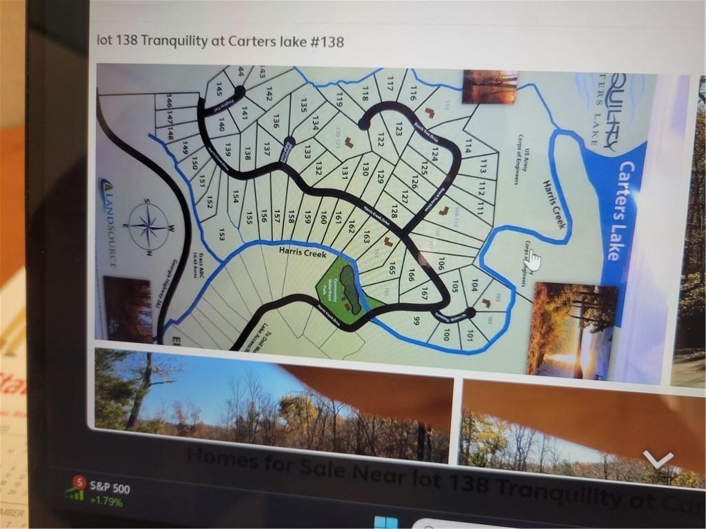Welcome to this 1 acre basement lot. Come and build your dream home in this highly sought after community of Doll Mountain in Tranquility at Carters Lake. It doesn't get better than this. Gated for your security, underground utilities, public water, paved roads, three minutes from the lake. Common areas with parks, playground, walking and hiking trails along Harris Creek. All of this and you are ten minutes from town! Simply incredible!