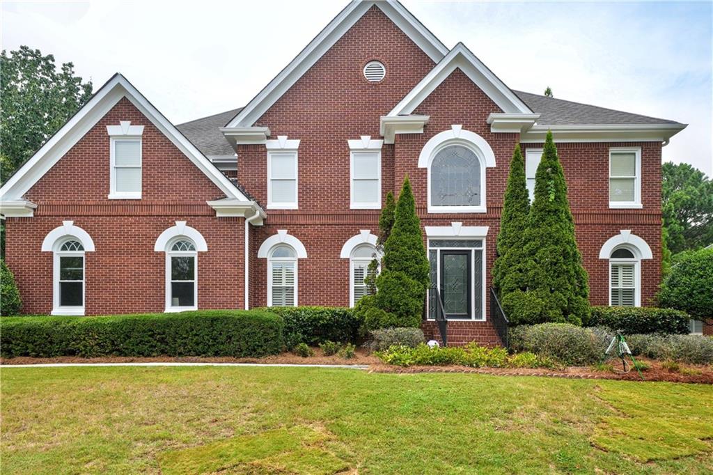Don't miss your chance to own this stunning, fully Renovated Home in the Heart of Johns Creek with rare Double Master + Designer Upgrades Throughout!
Johns Creek was recently ranked the #1 place to live by USNEWS! Conveniently located just minutes from North Point Mall, GA-400, and the top-rated Fulton Science Academy! Step inside to discover a rare double master layout, including an oversized upstairs primary suite featuring a spa-like renovated bath with a double vanity, large walk-in shower, freestanding tub, and massive walk-in closets. The main-level master is also fully renovated with double vanity as well as separate frameless shower and freestanding tub. Every single bedroom includes its own en-suite bathroom, offering privacy and comfort for the entire family or guests. Throughout the home, you’ll find new hardwood floors on the main level and high-end waterproof LVP in all other areas.
The main kitchen is a chef’s dream, featuring a waterfall island, natural oak cabinetry on the island with sleek white shaker cabinets, a premium 48" double oven gas range, and an impressive 60" built-in refrigerator. Whether you’re cooking for the family or entertaining guests, this kitchen is built to impress.
Enjoy the sun-drenched finished sunroom, perfect for relaxing, working, or hosting gatherings. The open-concept basement features a spacious media room—ideal as a home theater, gym, playroom, or flex space—plus a full bedroom for guests or extended family.
Step outside to a private, fenced backyard with brand new sod and landscaping, ideal for kids, pets, or weekend BBQs.
Owner/Agent