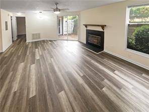 Very aggressive price to sell! Discover a hidden treasure in this charming condo, mostly renovated, which has 2 BDR/2 BTH , a balcony, a fireplace, and is an excellent location close to I-285 and I-85. Convenient to shopping, park, and restaurants. Spacious, renovated with modern updates. This home offers ultimate privacy and tranquility with its peaceful, scenic view. The updated kitchen is a culinary delight, showcasing sleek white cabinets, solid stone countertops, and new appliances. Water and Trash are included with the HOA. Enjoy the amenities, including a SWIMMING POOL and TENNIS COURTS, while surrounded by beautifully landscaped exteriors that reflect the pride of this friendly neighborhood. Great for first-time buyers or retirement.