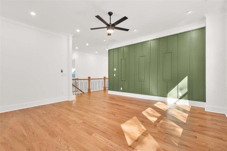 Discover Refined Living in the Gated Community of Tapestry Ridge.Complete and move-in ready, this exquisite Craftsman-style estate home is located amongst desirable Gwinnett County Schools and more. From the moment you arrive, the expansive front porch and elegant foyer set the tone for the refined interiors beyond.  The main level showcases 12-foot ceilings, upgraded mahogany hardwood flooring throughout the home , and massive  picture windows that fill the home with natural light. The formal living and dining rooms frame the foyer beautifully, leading into an impressive open-concept great room that flows seamlessly to a massive covered patio-perfect for indoor-outdoor entertaining. Enjoy the warmth of two fireplaces (one on each floor) creating a cozy, sophisticated ambiance.  The designer kitchen is a culinary centerpiece, featuring quartz countertops, extended cabinetry, and high-end stainless steel appliances including a 5-burner gas cooktop, wall oven, and built-in microwave. A deep-set sink, recessed lighting, and an inviting breakfast area complete this perfect gathering space. Two spacious guest bedrooms and a full bath complement the main level.  Upstairs, retreat to an opulent owner's suite with a spa-inspired bath featuring a modern soaking tub, oversized walk-in shower, bidet toilet, and a custom closet with an island. Three additional secondary bedrooms-two with ensuite baths-and a versatile loft provide ample comfort and flexibility.  The unfinished daylight basement design with a second patio offers limitless potential for customization-ideal for a home theater, gym, or recreation area-and overlooks a backyard perfectly suited for a pool.  Additional features include a tankless water heater and extra-high 3-car garage designed for larger vehicles and organized storage.  All of this within the coveted Gwinnett County School District, blending architectural elegance, functionality, and location into one exceptional lifestyle opportunity.  Don't miss your chance to experience refined living at its best-welcome home to Tapestry Ridge.