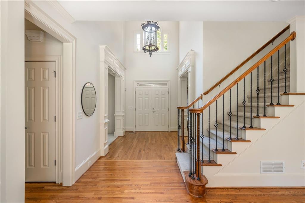 Imagine stepping out to a large, level backyard right from your kitchen—ready for you to create your own outdoor paradise! Whether you dream of adding a
pool, garden, or entertaining space, this 4-sided brick home offers the perfect setting to make it happen. Located in one of the area’s most exclusive and
sought-after neighborhoods, this 5-bedroom, 5.5-bath residence blends timeless construction with fresh updates. Inside, you’ll find new interior paint,
brand-new carpet, new terrace-level HVAC, and beautiful architectural details throughout. The open kitchen features warm wood cabinetry, granite countertops,
stainless steel appliances, and double ovens, flowing seamlessly into the breakfast area and family room—ideal for both everyday living and entertaining. The
formal living room offers flexibility and can easily serve as a home office or library. In contrast, the formal dining room is perfect for gatherings and special occasions with elegant millwork, hardwood floors, and abundant natural light. Upstairs, there are four spacious bedrooms, including a primary suite with an ensuite bath and dual vanities. Two bedrooms share a Jack-and-Jill bath, while the fourth enjoys its own private bathroom. A laundry room and built-in office
nook complete the upper level for added convenience. The finished terrace level expands your living space with a full bathroom, a recreation room perfect for
movie nights, room for a pool table, and a cozy fireplace that gives a warm, cabin-like feel. There’s also ample storage space and direct access to the
outside. With its solid brick exterior, move-in-ready updates, and a backyard full of potential, this home stands out as a true gem in a prime location close to
top schools, shopping, and dining. The home has been meticulously maintained. Experience the vibrant, family-friendly community featuring sidewalks
throughout, a clubhouse, resort-style pool with swim team, and tennis courts with an active tennis league. Conveniently located near top-rated public and
private schools, as well as Sharon Springs Park, Fowler Park, Big Creek Greenway, The Collection, and Halcyon—with quick and easy access to GA-400.