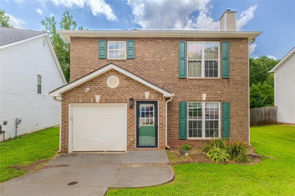 Enjoy easy living in this 3-bedroom, 2.5-bath home with no HOA restrictions. The open layout features a spacious living room with fireplace, luxury vinyl flooring, and a kitchen with stainless steel appliances, pantry, and breakfast bar. Upstairs, the owner’s suite offers a tray ceiling and private bath, while two additional bedrooms share a full bath. Outside, relax on the patio or in the backyard. Convenient to I-20, I-675, and I-285, with flexibility for personal use or rental opportunities.