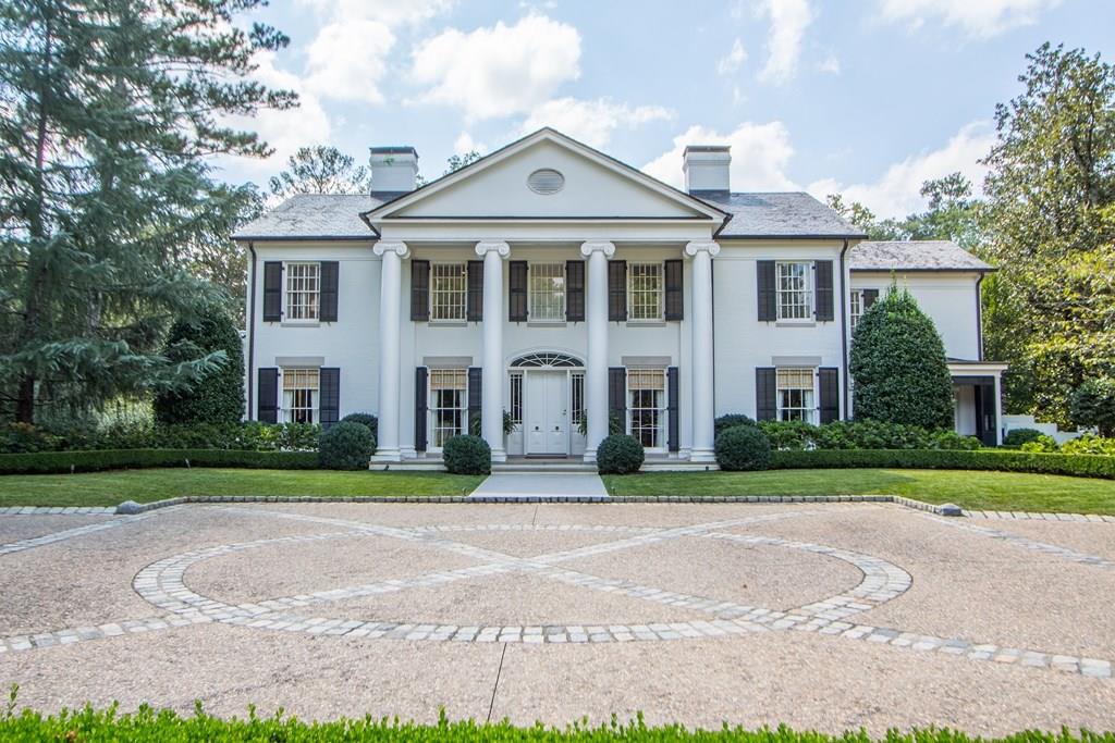 Built in the Greek Revival Style, this home was completely redesigned by Norman Askins in 2006, with decorative design details reminiscent of old Charleston. The redesigned home offers elements such as the traditional portico, a gracious center hall, well proportioned entertaining rooms and a new master suite on the main level. Beautifully manicured grounds designed by Richard Anderson include a formal English boxwood garden, a covered pavilion overlooking the pool and offering a beautiful woodland view.