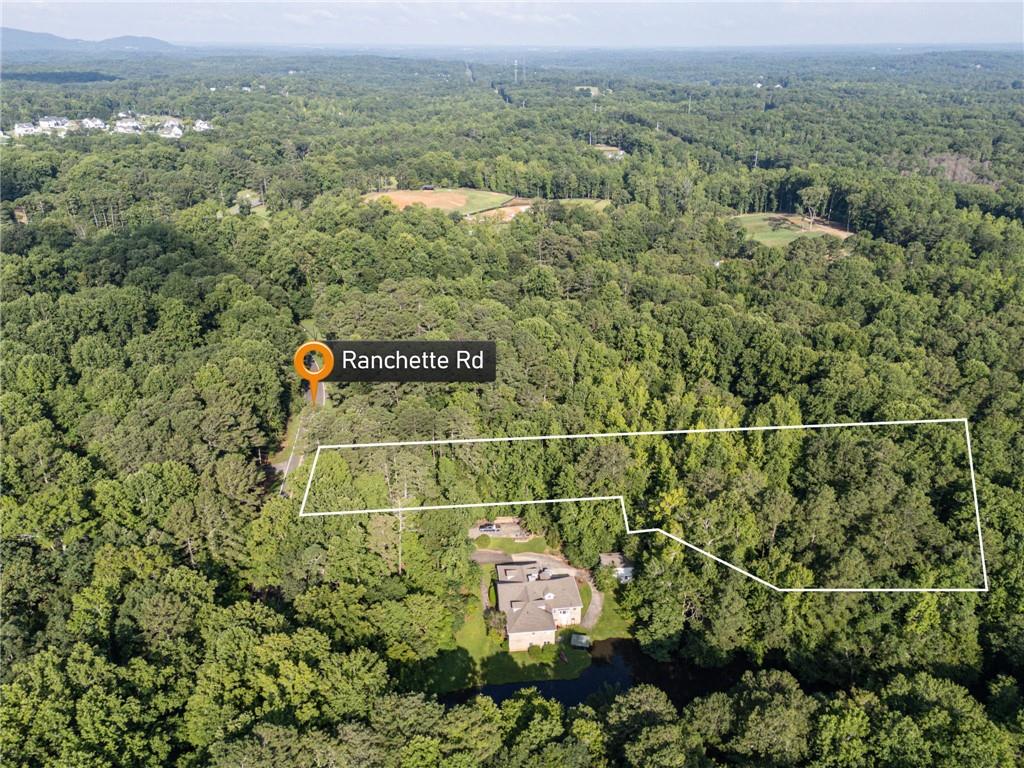 Welcome to 257 Ranchette Road, an exceptional opportunity to build your dream home on 2+ acres in one of Milton's sought after areas. Nestled on a quiet, established street surrounded by luxury estates and equestrian properties. This level lot offers both privacy and prestige. Set on a generous parcel, the property boasts mature hardwoods, open buildable space, views of the serene lake on the adjacent lot, and the flexibility to bring your own builder, with no HOA restrictions. Within minutes of vibrant Alpharetta, Avalon, GA-400 and top ranking schools, this is beyond a prime location!
Already Perc and Soil tested, and ready for your luxurious dream home or investment!