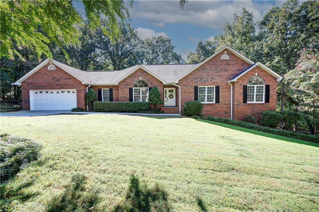 EXQUISITE RANCH OVER BASEMENT IN AMAKANATA WITH MULTI-GENERATIONAL LIVING POTENTIAL! This beautiful, BRICK-FRONT abode is nestled upon a SPACIOUS LOT in Thornwood at Amakanata Estates, centrally positioned off of Lovers Lane Road, and convenient to schools, shopping, dining, medical, and local attractions. Step inside to the FABULOUSLY FLOWING FOOTPRINT, to be welcomed into the LIVING ROOM, which is a spacious setting for both entertaining and everyday lounge. NATURAL LIGHTING illuminates the space, and brilliant OAK HARDWOODS are towered by VAULTED CEILINGS with a VENTLESS GAS LOG FIREPLACE serving as the focal point, providing a romantic ambiance for snuggling in on those crisp, Autumn mornings. The MAGAZINE-WORTHY KITCHEN is a cook’s delight, complete with: QUARTZ COUNTERS; STAINLESS APPLIANCE PACKAGE, including DOUBLE OVEN electric range with custom VENT HOOD above; Microwave, Dishwasher; and REFRIGERATOR. The PREP ISLAND also doubles as a BREAKFAST BAR, with room for seating 4, and the contrasting palette provides a timeless feel. The SPACIOUS LAUNDRY/UTILITY ROOM conveniently connects the 2-CAR GARAGE to the kitchen for unloading groceries with ease. Enjoy casual meals in the BREAKFAST ROOM, which is positioned amidst BAY WINDOWS and open to the kitchen, and enjoy more elegant entertaining in the FORMAL DINING ROOM, which is open to the living room. The LARGE AND LUXURIOUS OWNER’S SUITE, reminiscent of 5-star accommodations, is a soothing sanctuary to begin and end the day. Its magnificent bedroom boasts DOUBLE TRAY CEILINGS with RECESSED LIGHTING, and opens to the opulent ENSUITE. Its features include: Gorgeous TILE SHOWER with FRAMELESS GLASS ENCLOSURE; FREE STANDING TUB; and DOUBLE VANITIES, which flank a handy storage tower. A WALK-IN CLOSET is also in place for storing many fashions. The SECONDARY BEDROOMS are generously-sized, each with its own WALK-IN CLOSET, and share a hall bath with tub/shower combo. Enjoy FALL FESTIVITIES on the SPACIOUS BACK DECK, overlooking the PRIVATE BACKYARD with ESTABLISHED GARDEN bed. The LOWER LEVEL provides a SEPARATE LIVING QUARTERS, complete with its own PRIVATE 1-CAR GARAGE and SEPARATE DRIVEWAY. A spacious REC ROOM is in place, which would also make for a great LIVING ROOM and/or 4TH BEDOOM, as well as a FLEX SPACE (perfect for HOME OFFICE), and a FULL BATHROOM with WALK-IN SHOWER. This home is also equipped with a TANKLESS WATER HEATER, offering an endless supply of hot water. Experience the ultimate blend of elegance and functionality in a home designed to bring everyone together, while providing privacy, comfort, and luxury. Don’t miss the opportunity to call 175 Thornwood Drive your FOREVER HOME!