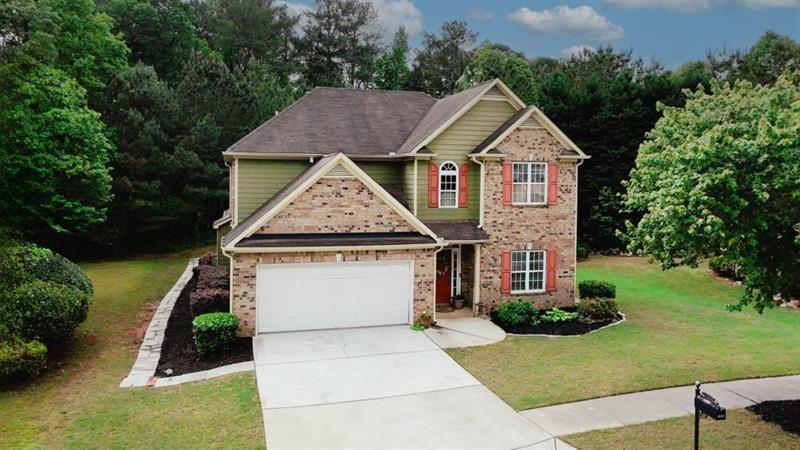 Welcome home to this beautifully maintained 4-bedroom, 2.5-bath, 2-story residence. It offers an inviting open floor plan and exceptional versatility! A stunning 70 x 70 addition with soaring vaulted ceilings has been added to the back of the home. This expansive area is perfect for a home-based business, a show-stopping entertainment area, or an in-law suite. The main level showcases newer LVP flooring throughout. Enjoy a bright, eat-in kitchen with stainless steel appliances. Spacious formal living and dining rooms sit at the front of the home. The primary suite offers comfort and style with an updated bath. The bath features a new vanity, mirrors, and contemporary light fixtures. Generously sized secondary bedrooms provide ample space for family or guests. The home is situated in the highly sought-after Grayson School District. The property offers convenient access to shopping, schools, parks, and more. Enjoy the outdoors in your beautifully manicured private yard. It's perfect for relaxing or entertaining.