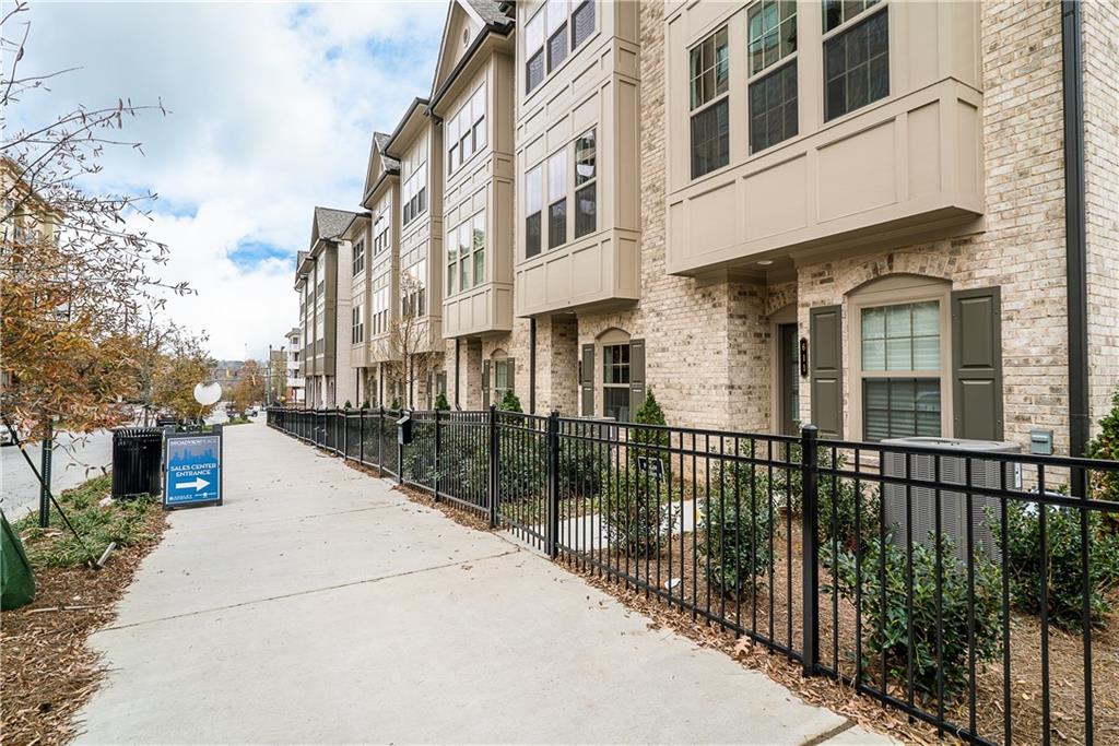 Newer construction, alluring tri-level townhome in the heart of Buckhead. 1st level has finished room (office/den) with 9'ceilings and front door access. Main floor has sleek kitchen with oversized breakfast bar and breakfast area open to great room for living and dining areas, 10' ceilings, plus half bath. Upstairs hallway has stack washer/dryer closet and linen closet. Primary bedroom with his and hers closets and 3 recessed windows. Primary bath features beautiful shower with classy tile and seat, large vanity with quartz top. Walk to Lindbergh Marta Station. *Photos are of model townhome, there may be slight differences in finishes. The application process involves checking credit, income, and running national criminal background reports. Please email all inquires. information, and showing requests.