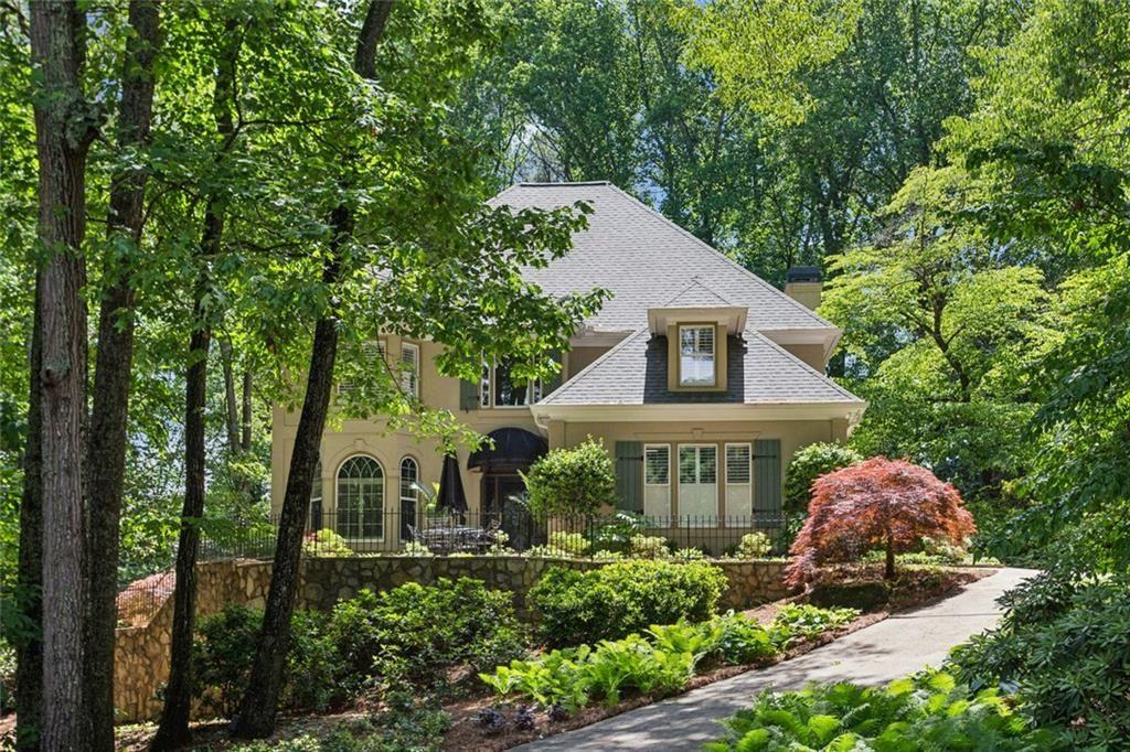 Fabulous Country French home nestled on 1.5 acres