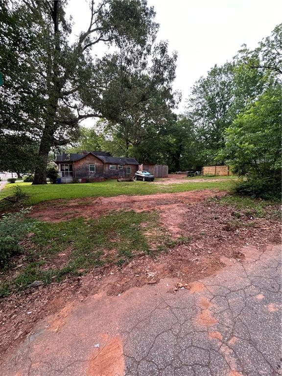 Welcome to 1862 Dunlap Avenue, a stunning parcel of land offering a fantastic opportunity to design and construct your dream home in the highly sought-after neighborhood. This level lot is located near Woodward Academy only a couple blocks away from College Park Historic District. Conveniently located close to Downtown and less than 10 mins away from Hartsfield Airport. Don't miss out on the chance to make this exceptional land yours. With its prime location, endless possibilities, and proximity to amenities, 1862 Dunlap Avenue represents a rare opportunity to build the perfect home in a highly sought-after neighborhood. Schedule a viewing today and start turning your dreams into reality!