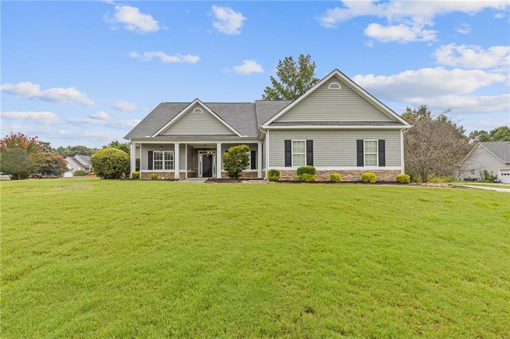 Welcome to this spacious ranch with a versatile double bonus area nestled on an upper level. This gorgeous home is perfectly situated on a beautiful 0.719-acre corner lot that is tucked away in a quiet cul-de-sac and is located in a sought-after school district, near shopping and amenities. This home features a desirable split floor plan with a generously sized primary suite, complete with a large en-suite bath, double vanities, a separate shower, and a relaxing soaking tub. Two secondary bedrooms and a full bath offer comfort for family or guests. Enjoy an open-concept layout that includes a flex/office space, formal dining room, and an eat-in kitchen that flows seamlessly into the inviting family room. Upstairs, you’ll find a spacious double bonus area—ideal for a playroom, media room, home gym, or additional guest space. You will be wowed by the oversized, private backyard with a covered porch that is perfect for relaxing or entertaining.
