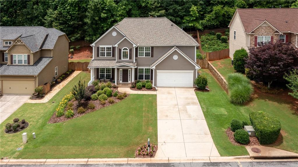 Welcome to your new home! This spacious and bright 5-bedroom, 2.5-bathroom house in a
desirable community in Forsyth County, offers comfort, convenience, and a vibrant
neighborhood atmosphere. Entrance with a front porch and features a 2-story foyer. Separate
formal dining and living room. The large kitchen with an island is open to the family room with
gas log fireplace. Main level has a bonus room with french doors. Primary bedroom and four
secondary bedrooms upstairs with brand new carpet. The laundry room is on the second floor.
Fully fenced and landscaped backyard offers privacy and space for outdoor activities.
Community amenities include pool and tennis courts. Award-winning, highly rated Forsyth
County schools nearby. Stem Certified High School and walk to Kelly Mill Elementary school
(Dual Language Immersion school)! Ideal for families looking to settle in a welcoming
community with excellent schools and recreational amenities. Close to downtown Cumming,
the Greenway, Cumming City Center, the Collection. This home is one of the best values
available in Cumming today!