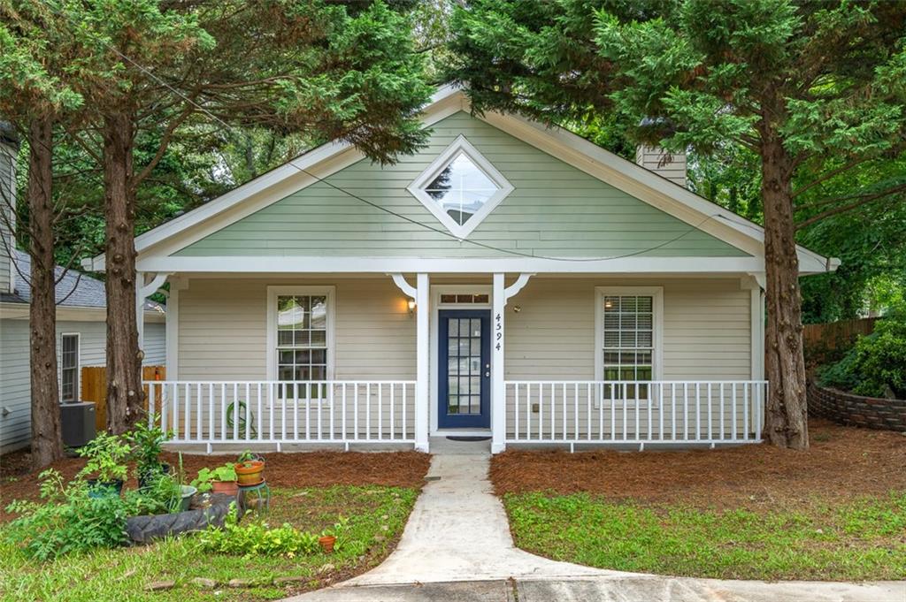 Welcome home to this delightful cottage nestled in the serene community of Pine Lake, Atlanta's hidden gem. This newer construction exudes charm from the moment you arrive, with a welcoming large front porch perfect for enjoying peaceful mornings. Step inside to be awed by the breathtaking high ceilings and the highly desired open floor plan that seamlessly combines the living room, kitchen, and dining room. This home offers a true primary oasis featuring a generous walk-in closet, a spacious bathroom complete with a separate soaking tub, and private access to the inviting back patio—ideal for unwinding after a long day. The two secondary bedrooms are spacious, each offering ample closet space and a shared bathroom. The allure of this home continues to its outdoor spaces, where a side courtyard offers the perfect setting for barbecuing and entertaining friends and family.
Pine Lake is known for its tranquil setting, featuring a large lake with a sandy beach, a clubhouse for community gatherings, plentiful fishing spots, scenic walking trails, and a community playground. Experience the perfect blend of nature and community in this charming cottage that promises peace and relaxation just minutes from the heart of Atlanta.