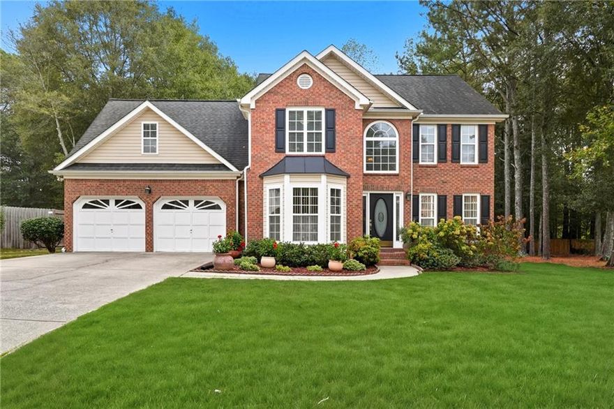 Located in a highly sought after, award winning school district, this stunning home sits on a large, level lot that has proudly earned Yard of the Month multiple times. The home has been meticulously maintained and thoughtfully upgraded over the years, showcasing true pride of ownership. Inside, you will find spacious rooms, an open and flowing floor plan, and gleaming real wood floors that add warmth and character throughout. The open concept kitchen features an inviting eat in breakfast area and top of the line stainless steel appliances, perfect for everyday living and entertaining. Step outside to enjoy the peace and tranquility of the private backyard oasis, complete with a brand new deck featuring built in color changing LED lighting to create the perfect evening ambiance. This home truly combines comfort, style, and curb appeal in one exceptional package.