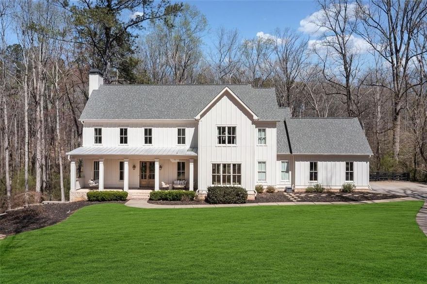 Tucked away on a private cul-de-sac lot in one of Alpharetta's most scenic equestrian enclaves, this beautiful designer appointed 6-bedroom, 5.5-bath estate offers the perfect blend of space, comfort, and quiet sophistication. The location is central to downtown Woodstock, Canton, Alpharetta, and Milton. High ceilings, natural light, and a seamless layout create an inviting flow throughout the home, ideal for both relaxed living and entertaining. At the center of it all is a chef’s kitchen with a 48-inch professional range, custom cabinetry, premium appliances, and an oversized island that brings everyone together. The main-level primary suite is a peaceful retreat with views of the private backyard, a spa-like bath, and a large walk-in closet—designed for comfort, function, and easy one-level living. The finished terrace level adds versatility with two additional bedrooms, generous entertaining areas, and flexible space for a gym, media room, or wine cellar. Upstairs, a bonus room above the garage and a second living area offer even more space to relax, work, or play—all enhanced by the home’s continued high ceilings and open feel. Outside, the expansive backyard provides endless possibilities for outdoor living—whether you envision a pool, garden, or simply the serenity of nature in your own private setting. A rare opportunity to enjoy graceful living in one of the areas most sought-after communities. An Alpharetta address with Cherokee county taxes, and in top rated school districts!