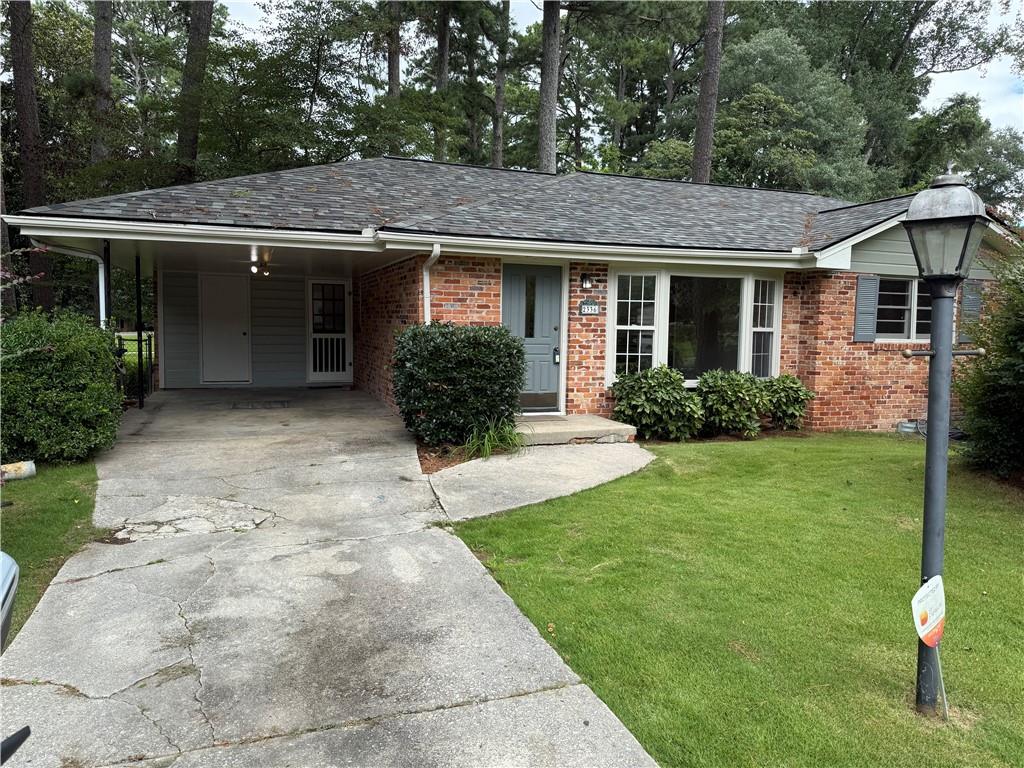 Stunning Renovation Now READY! Refinished Real Hardwood Flooring thru out! Brand New White Shaker Cabinets with Soft Close Drawers and Doors! Beautiful White Grain Quartz Countertops! Large Tile Backsplash! Under Mounted Stainless Steel Sink! New Appliances include Dishwasher, Side by Side Refrigerator, Gas Stove and Vent Hood! Large Laundry Area with plenty of Space/Storage. Two beautiful Remodeled Bathrooms! Hall Full Bath with Tub/Shower Combo and Owners Bath with Beautiful Shower and Frameless Glass! Bedrooms have Ceiling Fans! Large Private Deck off the back! Rent INCLUDES NO YARD WORK! Just Enjoy this Super Location in Chamblee/Doraville Area! Great to Buckhead, Lenox and Children's Hospital. One Covered Parking Space, and Storage room! $75/Adult Non-Refundable Application Fee, 650+ TransUnion Credit Score Required, 3 times monthly rent as income and Excellent Residential HIstory to qualify. Owner required to approve any pets/$500 pet fee.