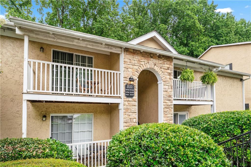 Welcome to this charming 2 bed, 1 bath top-floor condo located in the heart of Vinings! Just minutes from The Battery, Downtown Vinings, and Smyrna Market Village, this location offers unbeatable convenience and lifestyle. Step inside to find a bright, open layout featuring updated LED lighting in the living room and a beautifully refreshed kitchen with a brand-new backsplash and refrigerator. Enjoy your morning coffee on the private balcony or unwind in the walk-in shower with sleek glass doors. The HVAC system was replaced in May 2025 for peace of mind. This well-maintained community includes tennis/pickleball courts, a newly updated gym in the clubhouse, EV charging stations, and HOA-maintained exteriors. Perfect for easy living near all the action!
