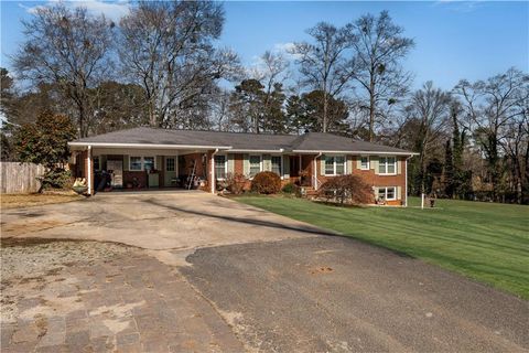 Photo of 4983 Arcado Road SW, Lilburn, GA 30047 (MLS # 7533043)
