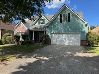 This beautiful 4 bedroom, 2.5 bath home offers one of the largest floor plans in the subdivision! The main floor includes a formal living room, a separate dining room, a well-equipped kitchen, and a cozy family room with a fireplace-ideal for entertaining guests or relaxing with family. Upstairs, enjoy a huge Master Suite featuring a generous sitting area, perfect for a home office or private retreat. Located just minutes from I-85, the Mall of Georgia, and a wide variety of shops and restaurants. Situated in a highly rated school district, this home combines space, comfort, and convenience in one unbeatable package. WE NEVER ADVERTISE ON CRAIGSLIST