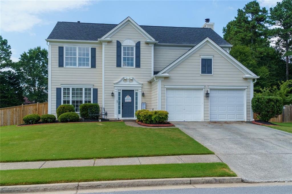 Charming Home on a Spacious Corner Lot in Desirable Brookshire! Close to Downtown Woodstock and The Outlet Shoppes of Atlanta.
Welcome to this beautifully updated two-story traditional nestled on a large, fenced-in corner lot in the sought-after Brookshire community. Step inside to brand new luxury vinyl plank flooring throughout the main living areas and enjoy the open-concept living/dining room—perfect for entertaining.
The kitchen is open and bright with sleek stainless steel appliances, a cozy breakfast area, and views into the spacious family room featuring a warm fireplace. A convenient powder room and a two-car garage complete the main level. Large fenced in backyard with oversized patio and firepit, great for cookouts and the perfect spot for playground/trampoline and all the outdoor fun. Upstairs, you’ll find a generous primary suite with an oversized en-suite bath that includes a walk-in shower, garden tub, and a large walk-in closet. Three additional bedrooms share a beautifully updated hall bathroom with a double vanity and modern stand-up shower. The laundry room is also conveniently located upstairs. Freshly painted throughout with all-new lighting, this home is move-in ready! Enjoy resort-style amenities including two sparkling pools, tennis courts, a playground, and more.
Don’t miss this opportunity to own a stunning home in one of the area’s most popular neighborhoods!
Great location close to the outlet mall and downtown Woodstock and Canton.