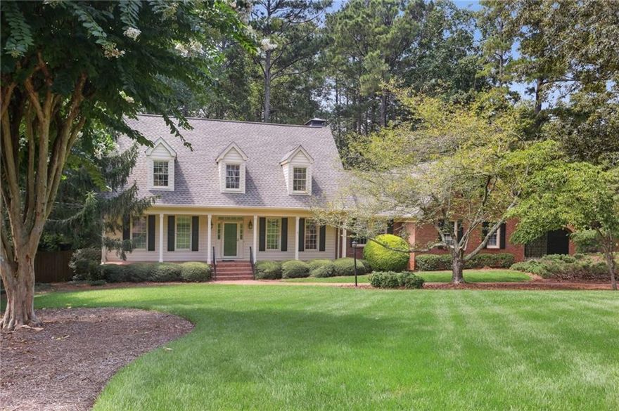 A-DOR-A-BLE original owner custom home in Oakton on North Saint Marys Lane!!  Gorgeous +/- 1 acre landscaped level yard that is wooded in the back.  Tall ceilings on the main level, with beautiful real wood hardwoods throughout.  Large kitchen with island, laundry room, formal living room plus a large den.  3 Bedrooms up (including a second primary suite) and a huge attic perfect for storage or expanding into.  Full unfinished basement with 2 different garage bays down there.  A shop, storage, flex space.... all the perfect space to finish, reno, or a Car Guy/Gal's dream!

The home features a 2 car garage on the main level, and then the driveway continues around to the back terrace level where there are two additional garage bays.

2 YEAR OLD ROOF, 3 YEAR OLD HVAC, HARDWOODS WERE REFINISHED IN 2021.

This is one of the most desirable streets in the City of Marietta featuring a close-knit community of custom homes, right up against Kennesaw Mtn National Park.