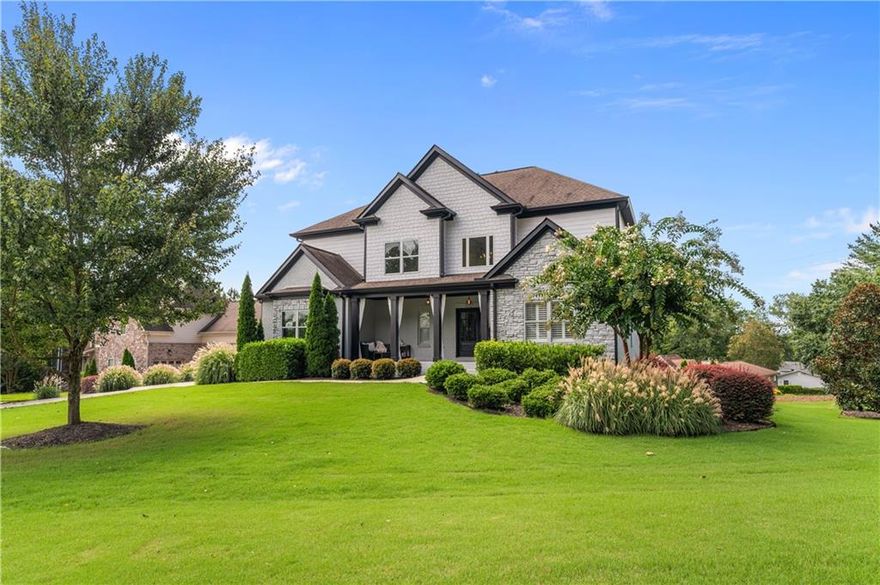 This beautifully upgraded East Cobb home offers the perfect blend of modern style and everyday comfort, all nestled in a quiet community! From the moment you arrive, the curb appeal shines with brand new double front doors, fresh exterior paint, and professional landscaping that make a lasting first impression. Step inside to a bright, two story foyer leading to an inviting fireside living room and a stunning, fully remodeled kitchen with sleek finishes and a spacious breakfast area. The main level also features a guest bedroom, a stylish half bath, and a walk out deck ideal for seamless indoor outdoor entertaining. Upstairs, the oversized primary suite feels like a private retreat with custom his and hers closets and a luxurious spa inspired bathroom. Three additional bedrooms, two full baths, a flexible bonus room, and a convenient laundry room provide plenty of space for everyone. Downstairs, the expansive 1,640 sq. ft. unfinished basement offers endless potential, perfect for a future media room, gym, or in-law suite. The two car garage is equipped with a 220V outlet for an EV charger, adding a touch of practicality and future readiness. Set on nearly half an acre with no HOA, this move-in ready home has been thoughtfully updated inside and out, combining comfort, convenience, and modern design in one exceptional East Cobb property.