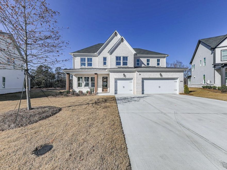 This new home,  showcases the highly sought-after Monteluce plan on a slab foundation with a stylish Transitional elevation. Located in Freestone Station, this property offers a large backyard and the perfect balance of suburban tranquility with proximity to shopping, dining, and excellent Cobb County schools.

The home features a chef-inspired kitchen with quartz countertops, Whirlpool appliances, quartz backsplash and a spacious island.  The kitchen flows into a casual dining area and a sun-filled, two-story great room with a striking floor-to-ceiling linear window wall.

Upstairs, 3 bedrooms include their own ensuite bathrooms, and the laundry room is equipped with a sink for added convenience. A grand catwalk overlooks the great room below, and the alternate Luxury Primary Bath boasts a freestanding tub for ultimate relaxation.

Additional highlights include an enlarged bedroom with an ensuite bathroom on the main level, oak wood stair treads, unfinished drop zone and home allows for new owner to add personal touches.

The community’s amenities, currently under construction, will include a pool, cabana, outdoor living area, kids play area, and pocket park.