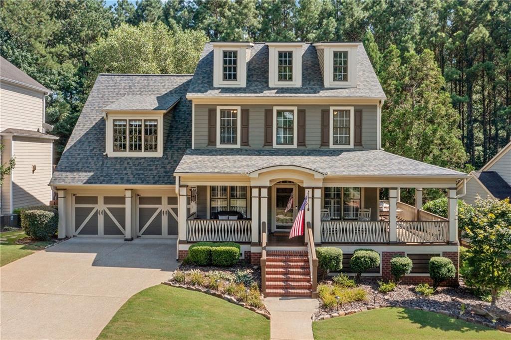 Charming 4BR/2.5BA Home with Wraparound Porch & Park Views – New Roof, Water heater & Carpet! Welcome home to this beautifully maintained 4-bedroom, 2.5-bath home on an unfinished basement, perfectly situated directly across from Central Park in a sought-after community River Green. Enjoy your morning coffee on the wraparound front porch while taking in serene views of the park, open green space, and walking trails just steps away. Inside, you'll find fresh new carpet, a brand-new roof, and a new water heater for worry-free living. The main level offers a bright, open layout with spacious living and dining areas, and an inviting kitchen with room to entertain. Upstairs, all four bedrooms are generously sized, including a large primary suite with a private bath and walk-in closet. The full unfinished basement offers endless potential—perfect for a home gym, media room, workshop, or future expansion. Gorgeous private backyard is very peaceful & is adjacent to HOA property! PLUS, don't miss the resort-style living with unbeatable neighborhood amenities: 2 clubhouses, 6 tennis courts, basketball court, soccer field, 2 playgrounds, 5 pools, 2 waterslides, a 5-acre lake, and scenic hiking trails.