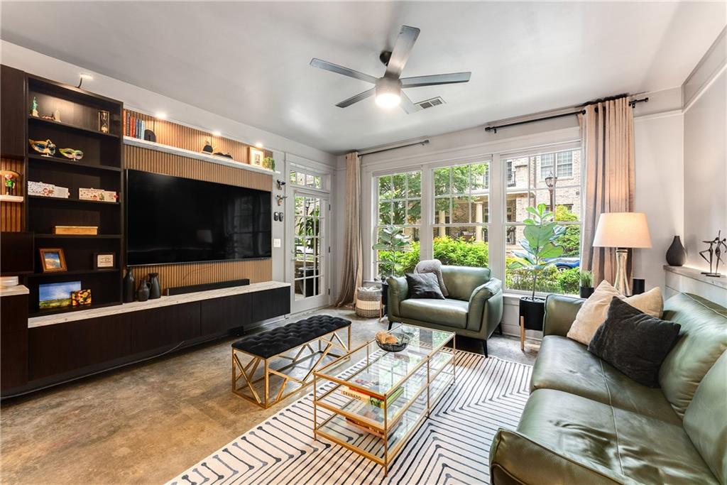 Uniquely swanky, spacious, open space in this updated condo in one of Midtown's exclusive, park-side locations of Wilburn House. Bright, open kitchen, separate dining area and large living area with room enough for flexible spaces, including a home office. Spacious, enclosed balcony for your outdoor living. The ultimate amenity - Piedmont Park just outside your door.