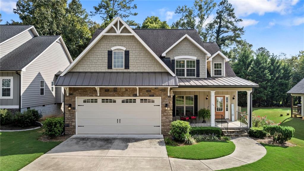 CONVENIENT & ELEGANT - Conveniently located 10 minutes from Rome. Easy access to Hwy's 53, 411, and 27. Minutes from schools, hospitals, Rome Tennis Center, and Etowah Park...super convenient!! Unique, Elegant elements belong to this home such as a beautiful staircase and Juliet balcony both overlooking a 2-story great room and cozy, stone, gas-log fireplace. Another elegant feature is the butler's pantry adjacent to the dining room. The primary bath on the main level offers a spacious shower, a separate tub, and 2 splendid closets. Relax and enjoy the covered, front porch, the screened-in back porch, or the stone patio inside the fenced-in back yard. Entering from the garage offers a mudroom area complete with cabinets, cubbies, bench and coat hooks to meet your organizational needs. The expansive upstairs includes 3 additional bedrooms, 2 full baths, and a multi-purpose bonus room. The Forest Glen neighborhood offers a green-space and community library for all to enjoy!